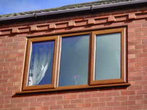 Swish oak finish uPVC windows